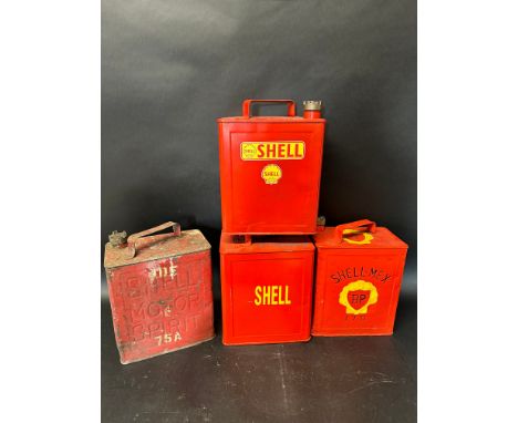 Four 2 gallon petrol cans: Shell Motor Spirit with Shell-Mex cap, the other three repainted, two with applied Shell branded s