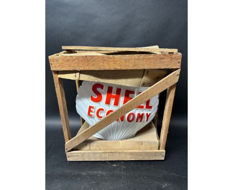 A Shell Economy glass petrol pump globe in original packing crate. 