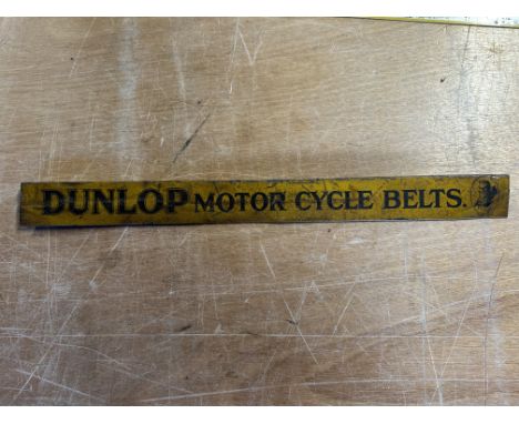 A Dunlop Motor Cycle Belts tin shelf strip, 18 x 1 3/4".&nbsp;