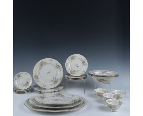 This beautiful set is crafted in the Apple Blossom pattern, featuring delicate pink-tinted apple blossoms nestled among green