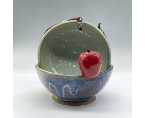 Features a ceramic bowl within a bowl rendered with layers of dripping glaze to give it a glaze crawl effect and a snake in p