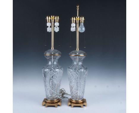 Cut crystal center with starburst pattern set on brass square base. Brass housing rod holds dual lamp light source with pull 