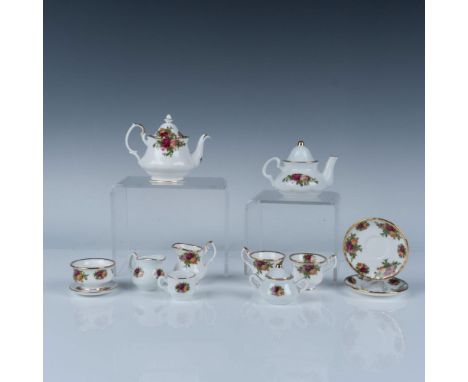 Adorable miniature collection of Old Country Roses patterned tea service. Lot includes two teapots with lids, two creamers, a