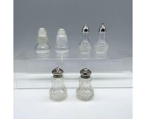 Splendid collection of three different pairs of salt and peppers shakers that includes a sterling silver lidded 10g duo backs