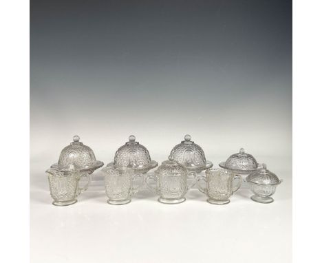 Glass bowl and creamer set featuring a fish scale pattern includes four butter plates with lids, two sugar bowls with a lid, 