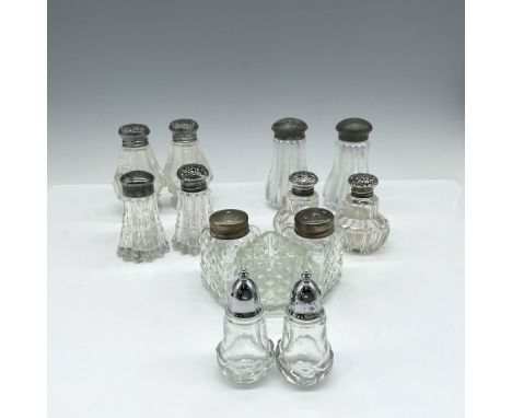 Elegant and decorative glass designs with silver toned metal tops. Glass designs include hobnail, bulb, ribbed, art deco and 