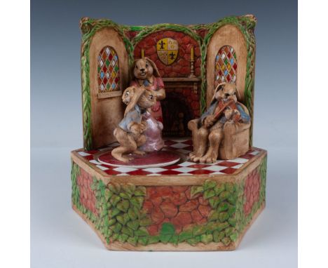 Finished in glazed ceramic in the style of Beatrix Potter, this charming musical scene of a bunny family dancing to the fathe