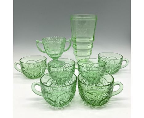 Light green glass includes 6 cups with cut fan and star patterns; uranium glass footed sugar bowl with sawtooth and block cut