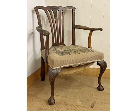 George III mahogany carver chair, the pierced fan back carved with Welsh feathers, stuffover tapestry seat, acanthus cabriole