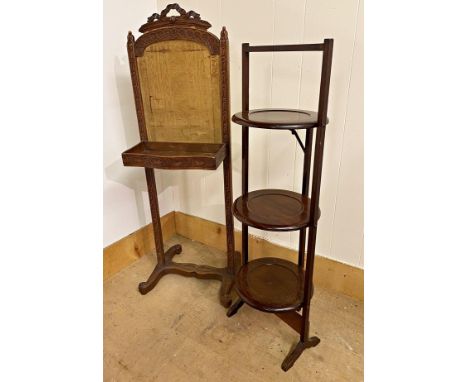 French oak fire screen, with carved frame and tapestry panel, together with a mahogany three tier folding cake stand and suth