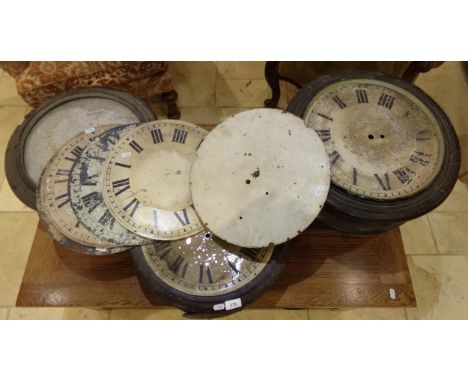 Collection of military issue wall clock bits to include four cases, four dials and movement 