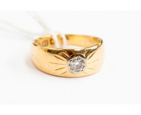 An 18ct gold and diamond set dress ring, comprising a central set diamond approx 0.15ct, size L, total gross weight approx 4.