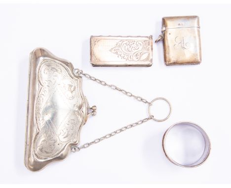 A silver vesta case, along with another and a napkin ring, combined total gross weight approx 2.13ozt and a late Victorian wh