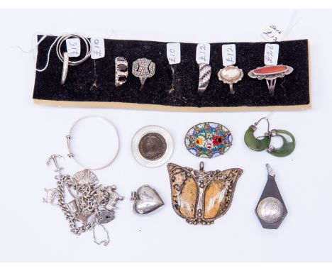 Six silver rings, together with agate pendant, jade earrings, silver charm bracelet, two pendants, two brooches and an infant