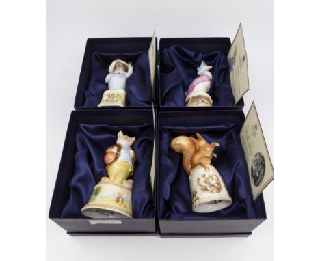 Four Royal Worcester candle snuffers, Squirrel Nutkin, Tom Kitten, Pigling Bland and Jemima Puddle Duck