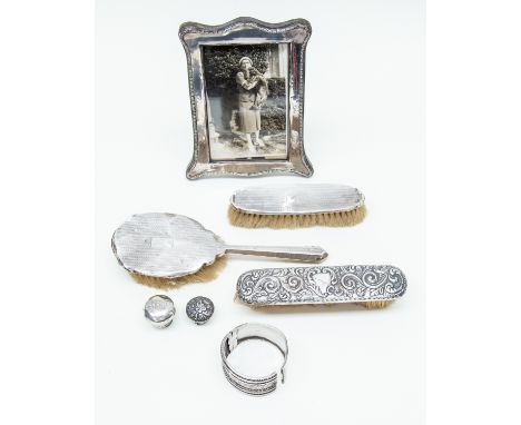 Silver backed hair/clothes brushes, bangle, walking cane tops, photo frame, some a/f (9) 