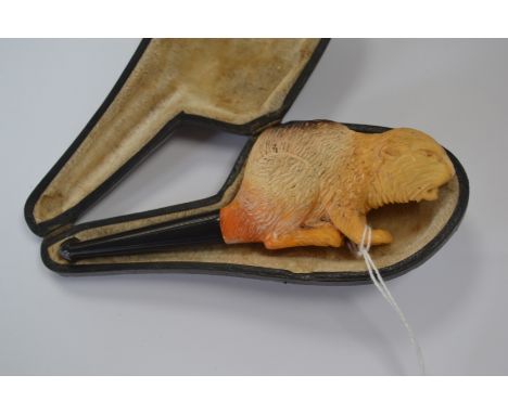 Smoking interest; a Meerscham style pipe, carved Beaver