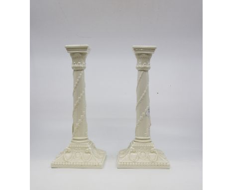 Pair of Royal Worcester ivory coloured candle sticks A/F