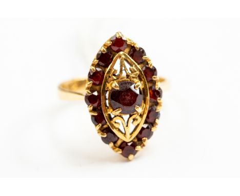 An 18ct gold garnet ring, lozenge shape, size N, gross weight approx 4.9gms