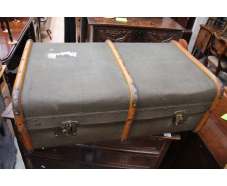 A steamer trunk, bentwood and canvas, khaki
