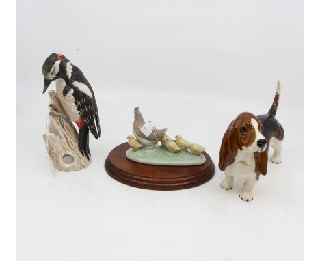 Various figurines to include; Beswick Bassett Hound, Goebel Great Spotted Woodpecker, Nao Hen &amp; Chicks (Q)