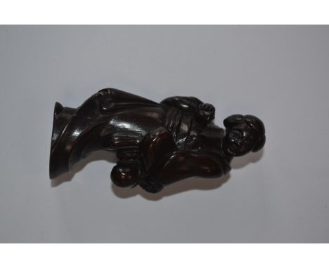 A treen netsuke in the form of a Geisha, signed 
