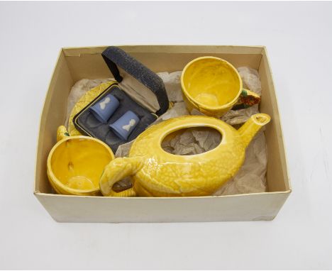 A 1930's children's two piece teaset, yellow ground with leaf mould decoration (box); a pair of Wedgwood thimbles and a pair 