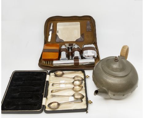 A boxed set of silver teaspoons, EPNS teaspoons and other versions along with a cased travel vanity set and gents grooming/wa