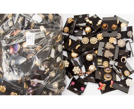 A large collection of vintage clip earrings