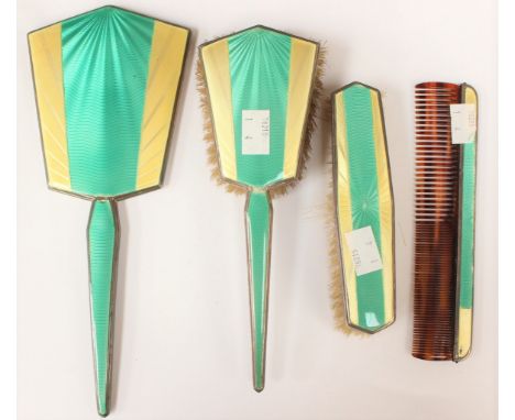 An Art Deco four piece silver and enamel brush set (s,d) (4)