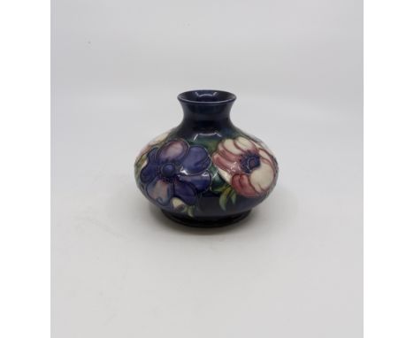 A vintage Moorcroft Anemone pattern onion shaped vase