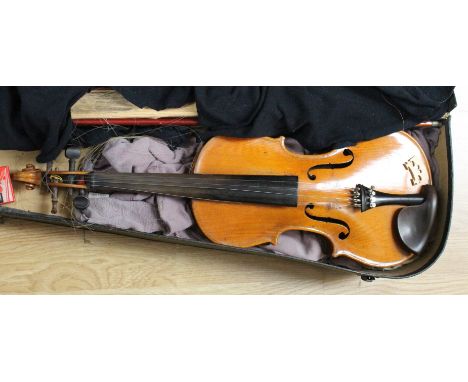 A cased vintage two piece back violin, inlaid mother of pearl, with three bows