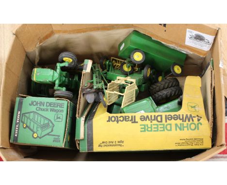 ERTL John Deere four wheel drive tractor and chuck wagon, both boxed, plus another tractor, plough seed drill and trailer, un