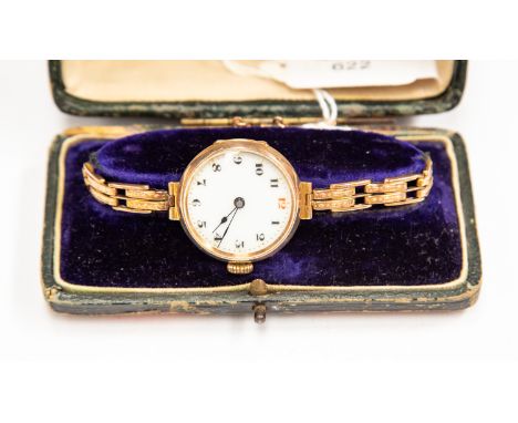 A 1930's 9ct gold ladies wristwatch, enamel dial engraved back, patterned expander  bracelet, total gross weight 20.6 grams, 