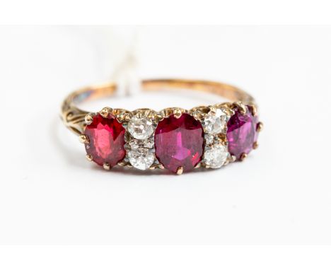 An 18ct gold, ruby and diamond ring, size M½, gross weight approx 3.1gms