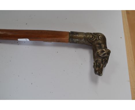 A Victorian style walking stick, the handle cast as a hounds head