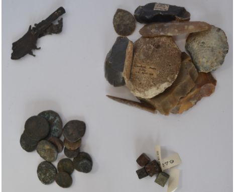 Prehistoric Stone Tool GroupA collection of flint tools, including scrapers, blades and an arrowhead, some with inked labels 