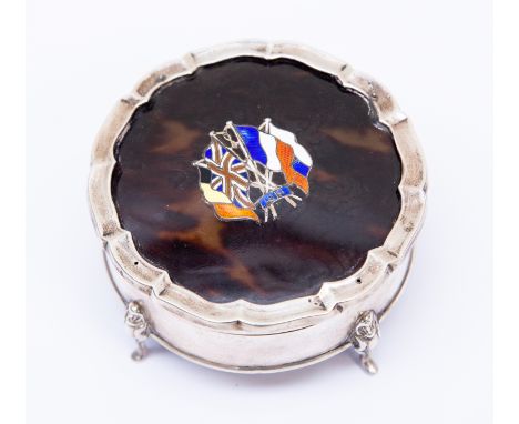 Military Interest; A WWI circular silver and tortoiseshell trinket box, by Henry Mathews, assayed Birmingham 1914, having sil