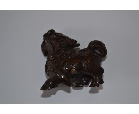 A treen netsuke of Kylin, signed