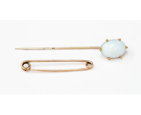 An Edwardian gilt metal synthetic Opal type glass set stick pin and an unmarked rose metal tie pin, weight approx 2.5 gms (2)