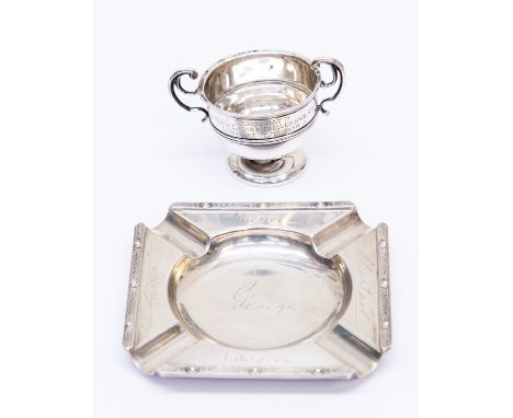 An Edwardian silver miniature two handled cup/trophy, with inscription: HERNE BAY GOLF CLUB LADIES CHALLENGE CUP OPEN MEETING