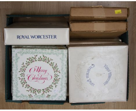 Collectors plates; two Spode Christmas plates, six Royal Doulton Christmas plates, four Royal Worcester Christmas plates (12)