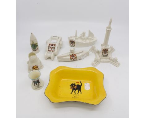 Ashbourne Derbyshire interest; two Louis Wain style cats, crested ornaments, together with a WWI tank, shell case, sailing ve