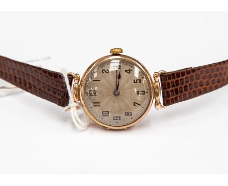 Rolex, a 9ct gold Rolex wristwatch, circa 1929, 2cm circular engine turned silvered dial with Arabic numerals, signed to the 