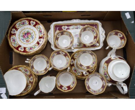 A Royal Albert Lady Hamilton tea service, comprising:  12 cups and saucers, 12 side plates, teapot, milk jug and sugar basin,