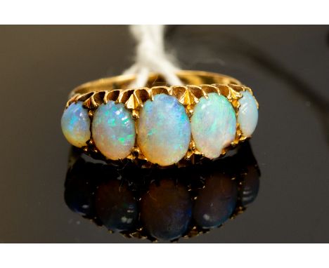 An 18ct gold and opal five-stone ring, size L, gross weight approx 3.5gms