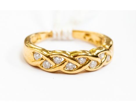 An 18ct gold and diamond half eternity ring, size I½, approx 3.1gms