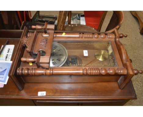 A Vienna style two hole wall clock 