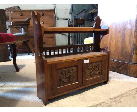 A Small Edwardian carved walnut table top cabinet, possible for spices, with open shelf and two cupboard doors H60cm, W61cm, 