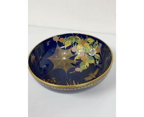 A Carltonware lapis blue ground enamel decorated bowl with butterfly and spider design (10cm x d.24cm)